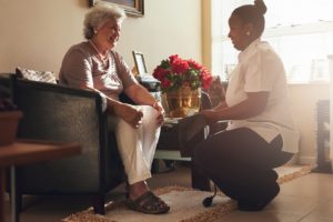 An elderly woman receives Alzheimer’s and dementia care in her home in Sacramento, CA.